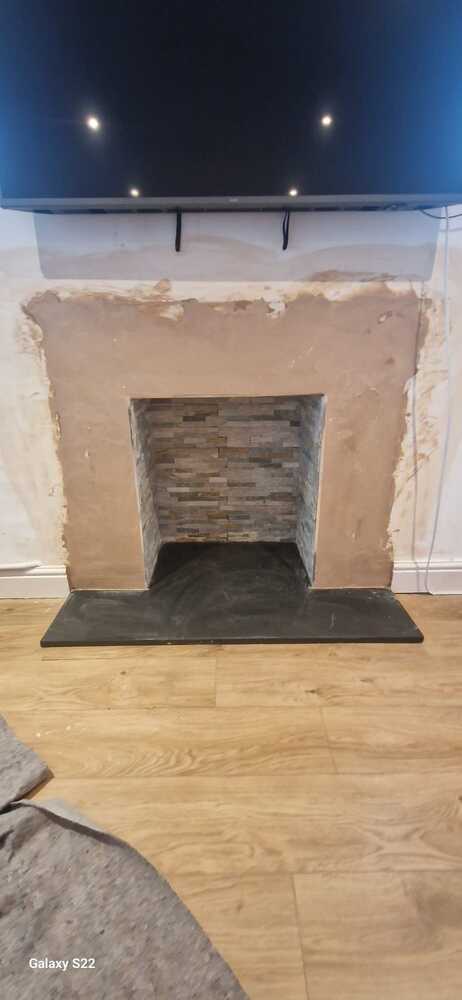 Fire-opening-plastered-and-finished-with-aluminium-edging-for-Multifuel-Stove-and-Oak-Mantel-Installation-Pontardawe-Swansea-Valley